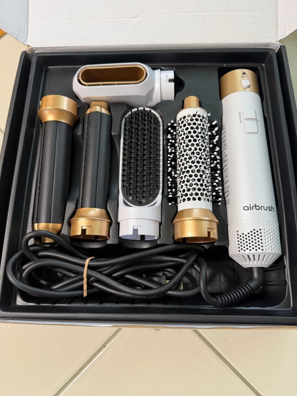 Brand new Air Brush with multiple attachments . Free  additional curler set
